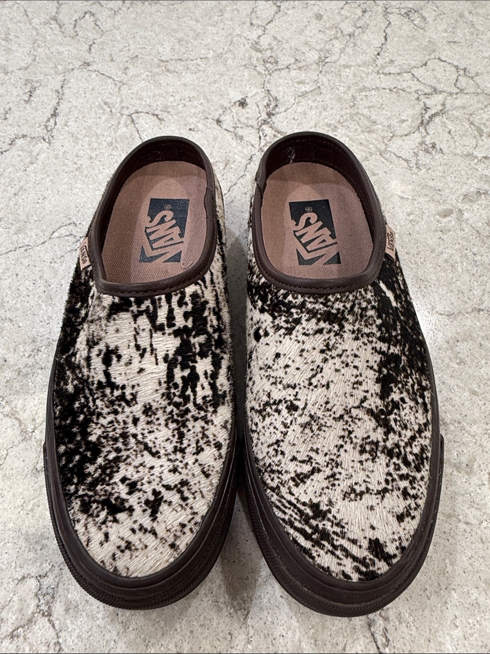 Vans Men/Womens's Slip-On Shoes in Black and White Cow Print
